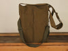 Khaki army surplus  bag with emblem.