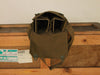 Khaki army surplus  bag with emblem.